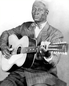 During the 1940s, folklorist Alan Lomax took this photograph of Huddie "Leadbelly" Ledbetter