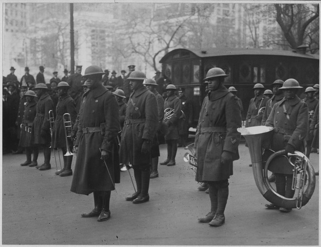 Lieutenant James [Reese] Europe and his famous band of the 369th Infantry in the parade in Fifth Ave.