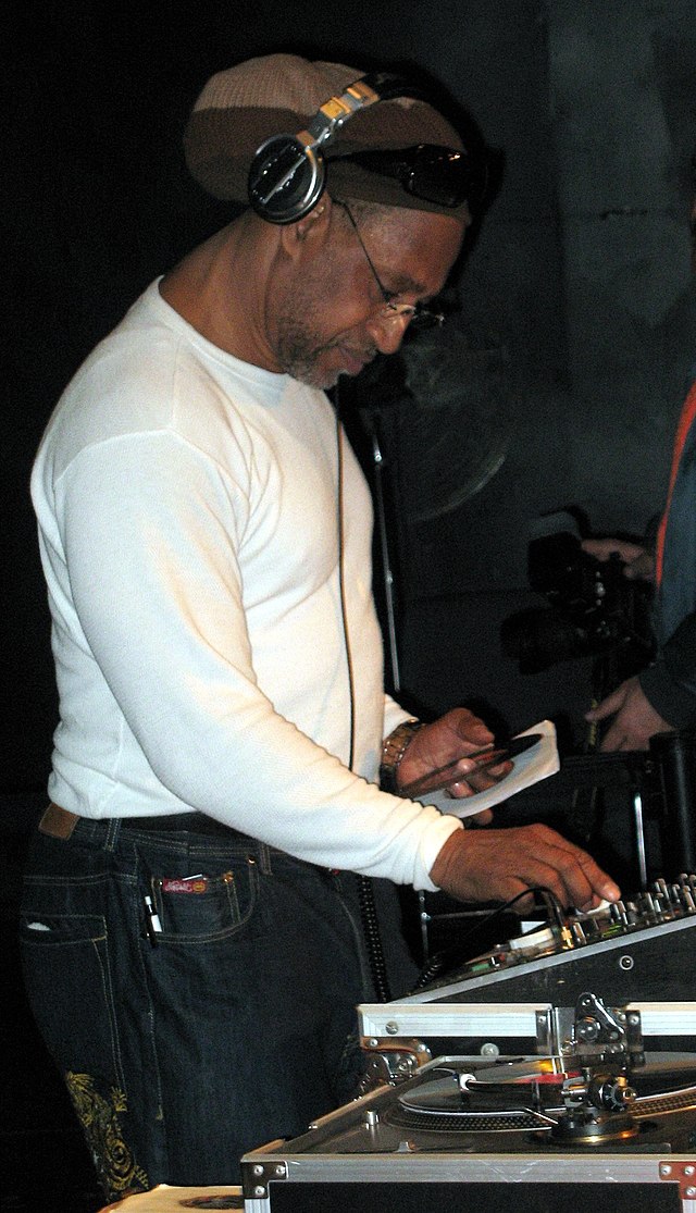 DJ Kool Herc spins records in the Hunts Point section of the Bronx at a February 28, 2009